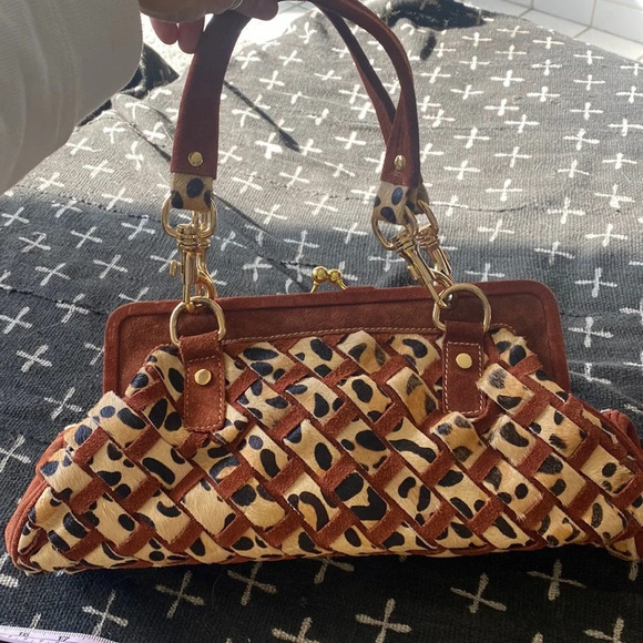 lust 4 luxe Handbags - Gretchen Christine Rossi of OCH Lust 4 Luxe. An animal print leather handles